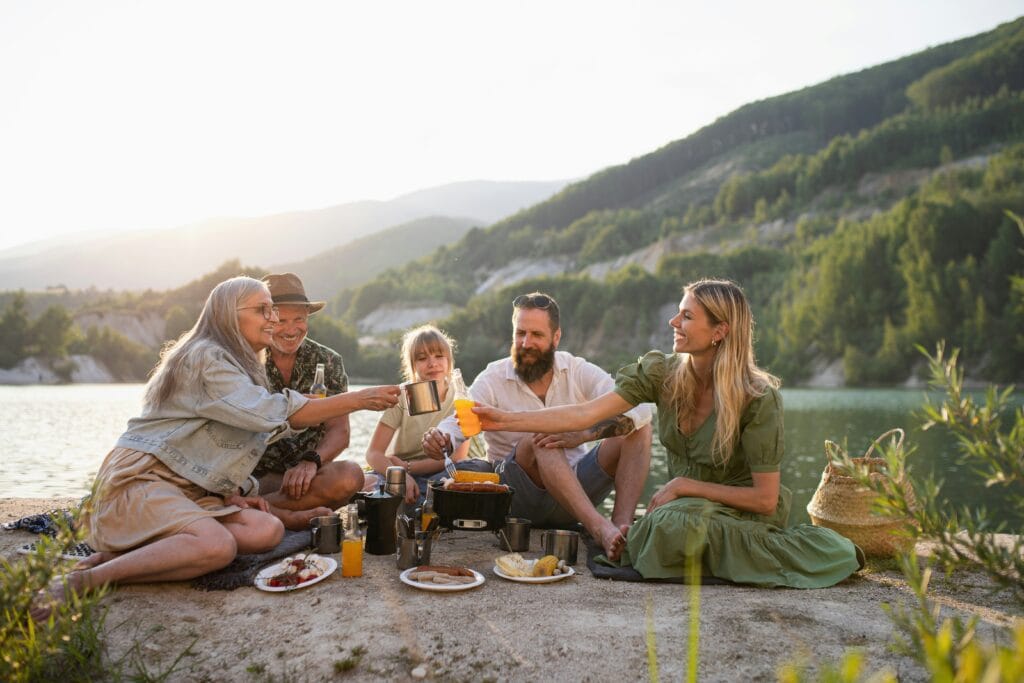 A multigenerational family smiling together during a guided excursion on a European river cruise.